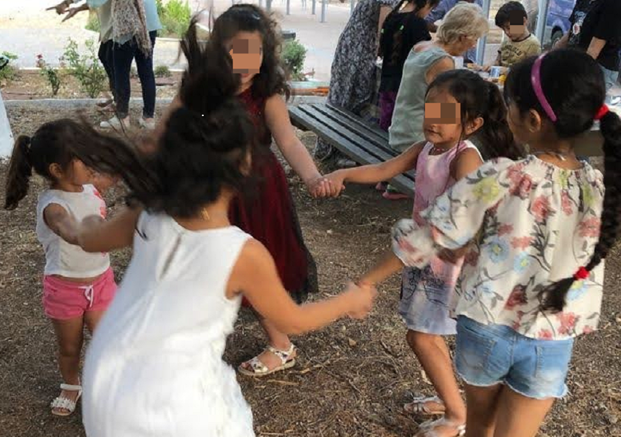 Refugee Children Playing In Crete